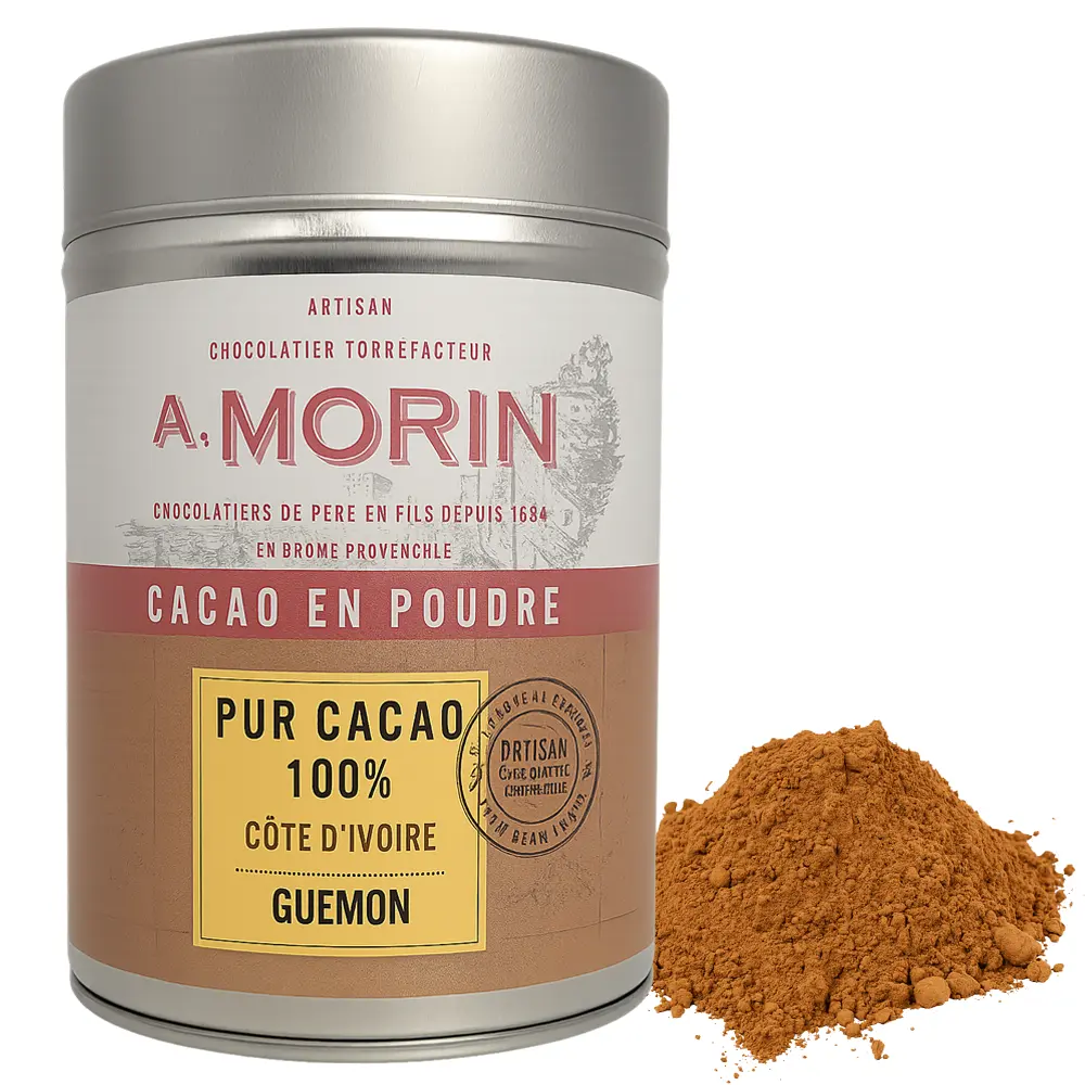 Foto einer silbernen Metalldose mit A. Morin Kakaopulver – „Pur Cacao 100 % Côte d’Ivoire Guémon“. Die Dose zeigt ein cremefarben-rotes Etikett mit gelbem Feld für die Herkunftsangabe und trägt den Aufdruck Pur Cacao